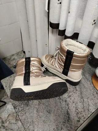 Botas de nieve/ descanso