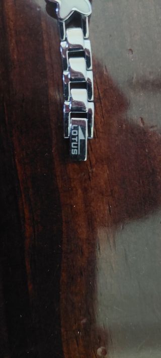 RELOJ LOTUS DE ACERO