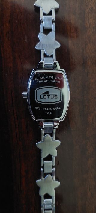 RELOJ LOTUS DE ACERO
