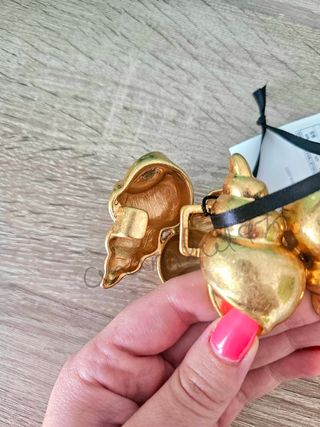 Cinturón metálico caracolas dorado zara