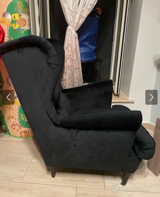 Poltrona nera in velluto