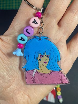 Un portachiavi a scelta jem and the holograms