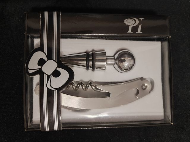 Juego de Sacacorchos y Tapa del vino