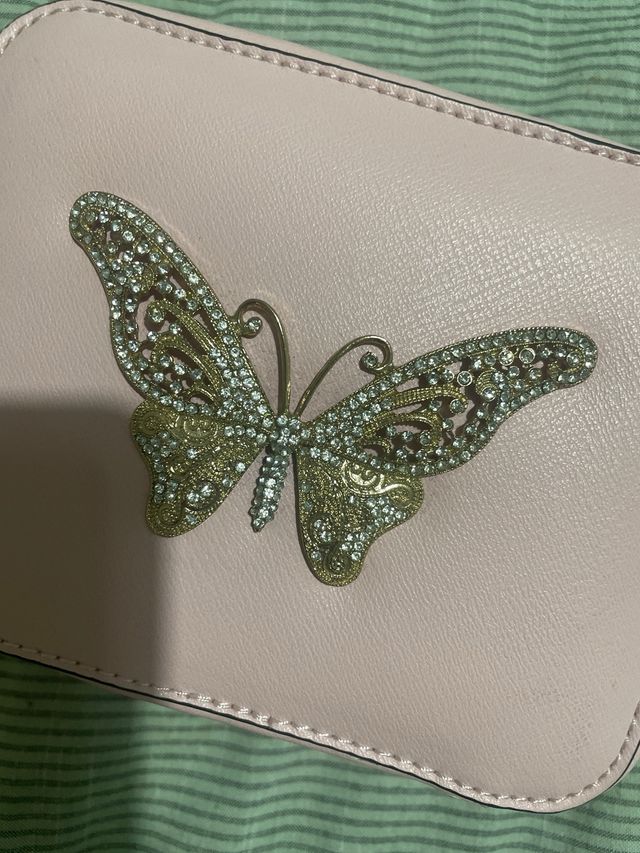 Borsetta rosa a cubetto da ragazzina