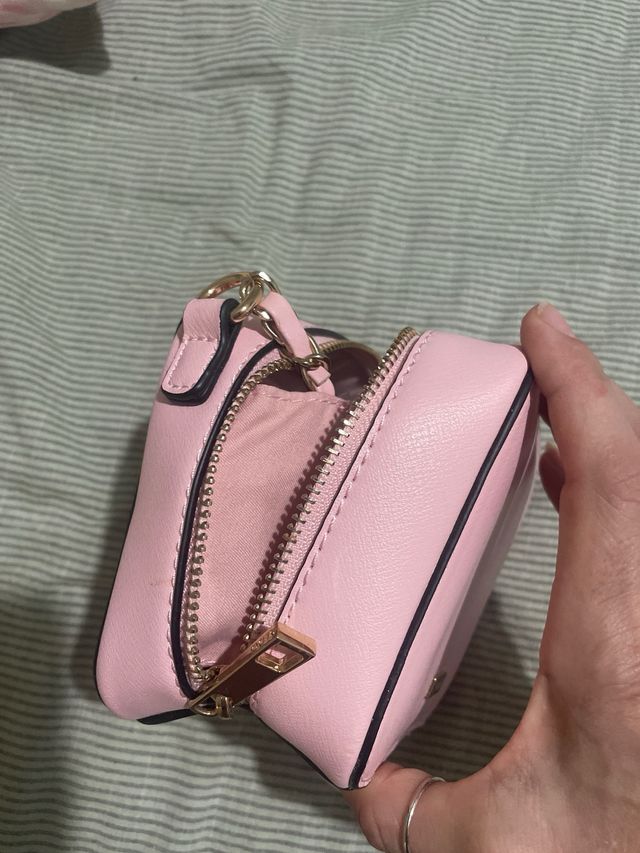 Borsetta rosa a cubetto da ragazzina