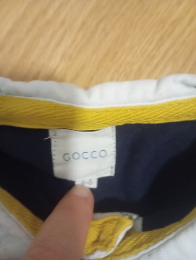 Polo Gocco azul marino y amarillo
