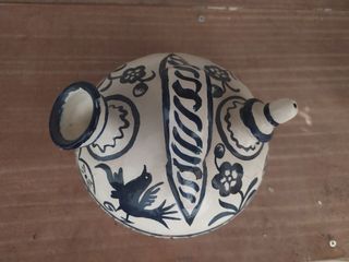 Botijo de barro rojo.