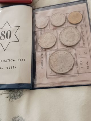 Carteras de monedas, cartillas.
