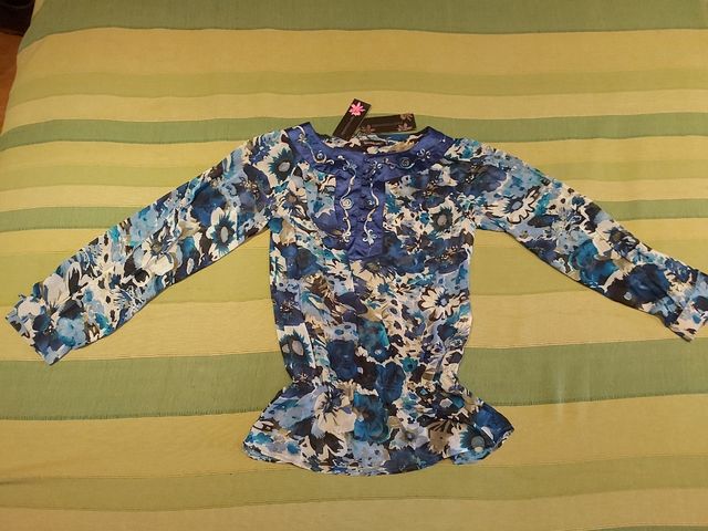 Blusa manga larga.