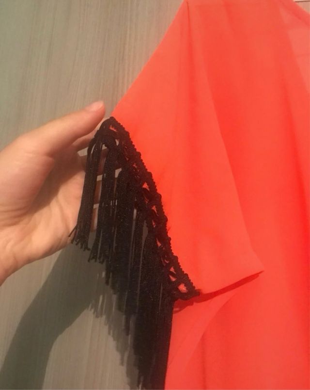 Blusa con frangie taglia unica