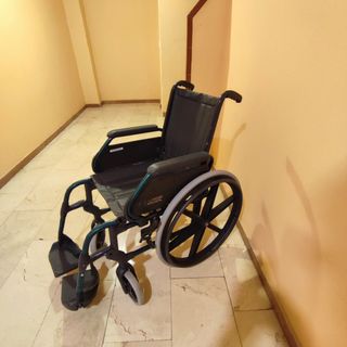 Silla de ruedas plegable desmontable