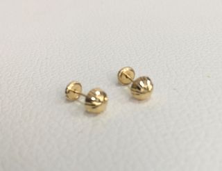 Pendientes niña 1/2 bola tallada oro 18k