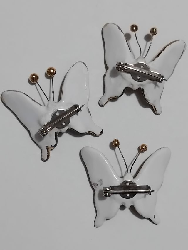 Spille in ceramica smaltata