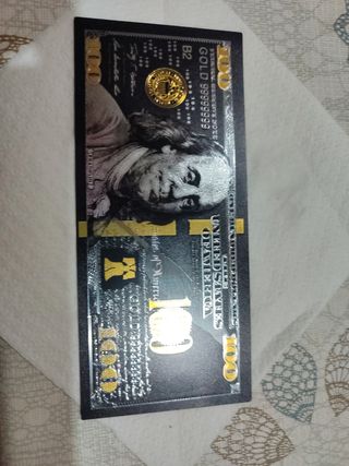 Billete 100 dolares negro, plata y oro.