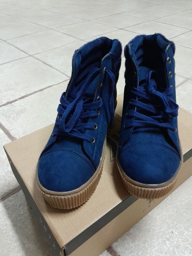 Botas azules de mujer