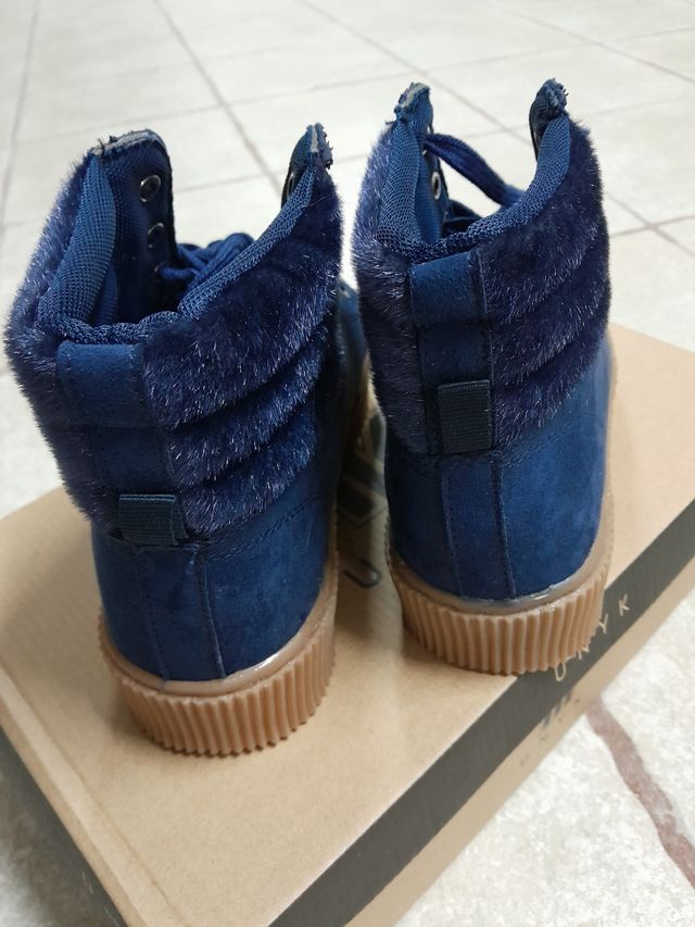 Botas azules de mujer