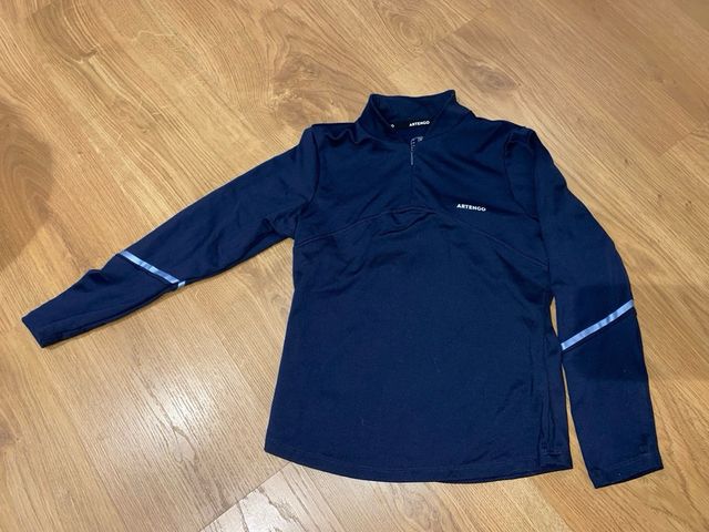 Jersey deporte Decathlon niña azul marino. Talla 8