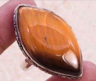 Precioso anillo ojo de tigre baño plata