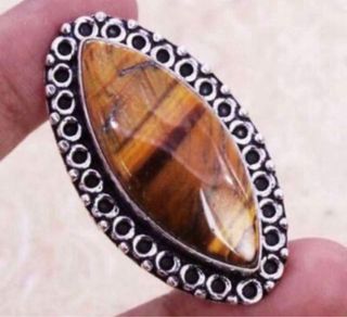 Gran anillo oko de tigre baño plata
