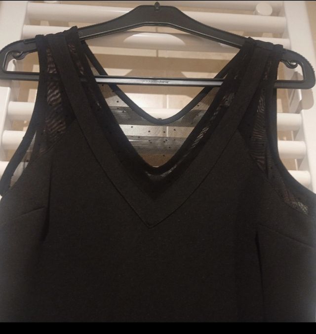 Mono negro elegante sin estrenar