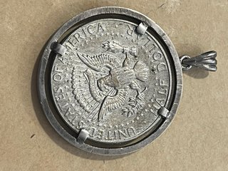 Colgante moneda