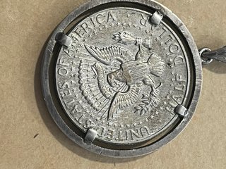 Colgante moneda