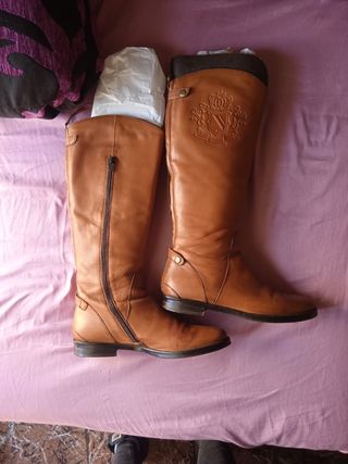 Botas altas de piel