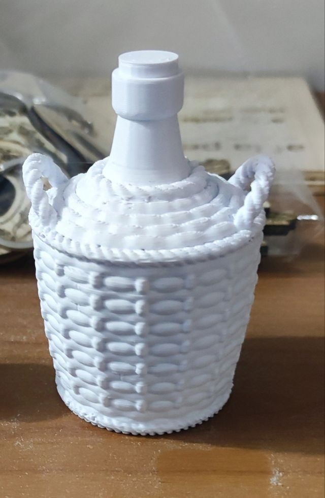 Damigiana con cestino