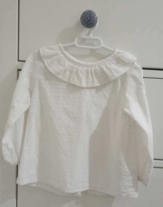 Blusa cuello bebé plumeti