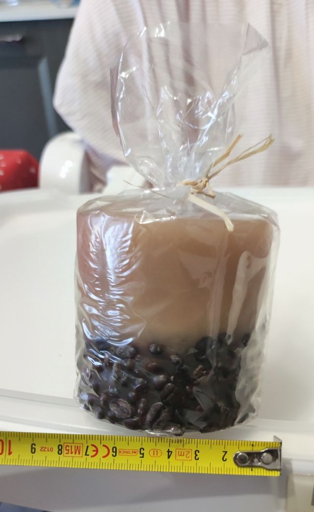 Candela con chicchi di caffe