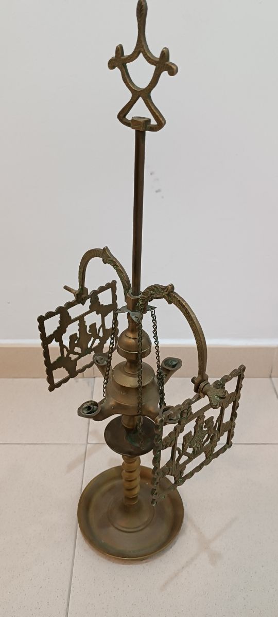 Antiguo velón de bronce