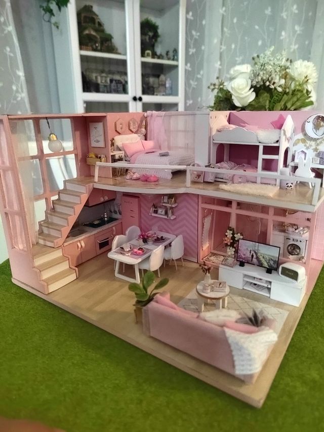 Casa de muñecas rosa