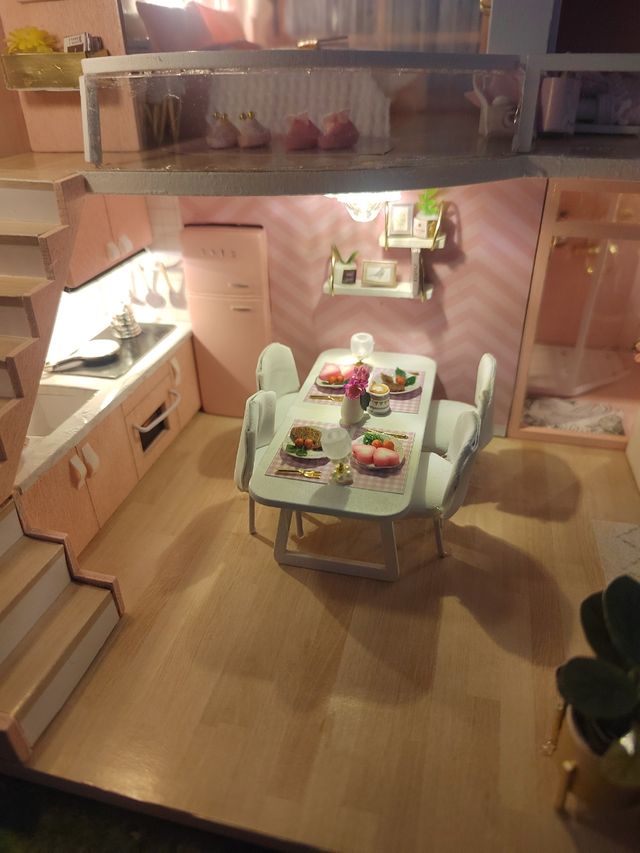 Casa de muñecas rosa