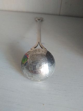 Cuchara antigua moneda