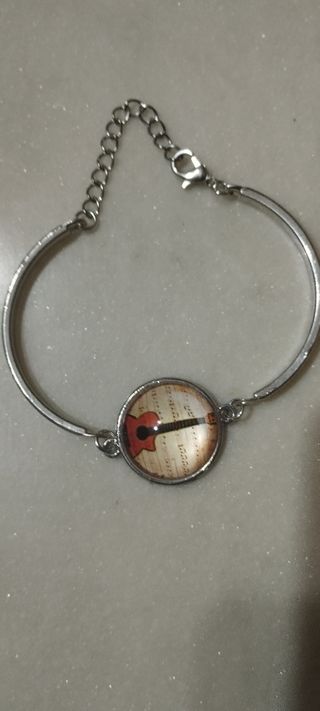 Bracciale flamenco Guitarra unisex .. descuento 