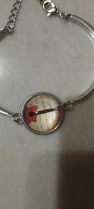 Bracciale flamenco Guitarra unisex .. descuento 