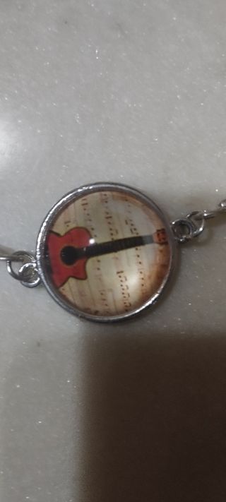 Bracciale flamenco Guitarra unisex .. descuento 