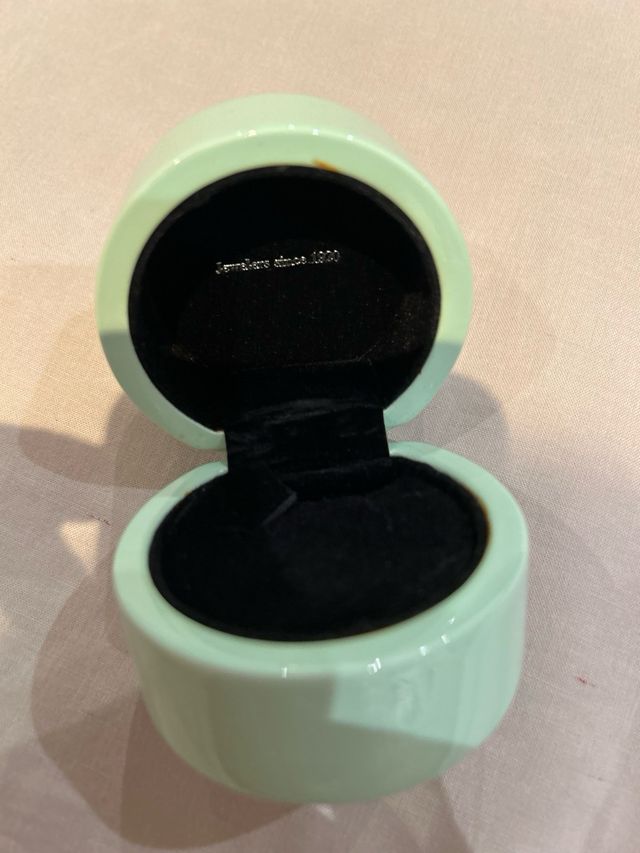 Caja de Tous lacada y otra gris mas pequeña