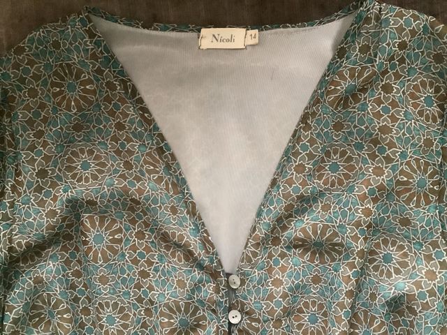 Mono de Nicoli marrón talla 14 años