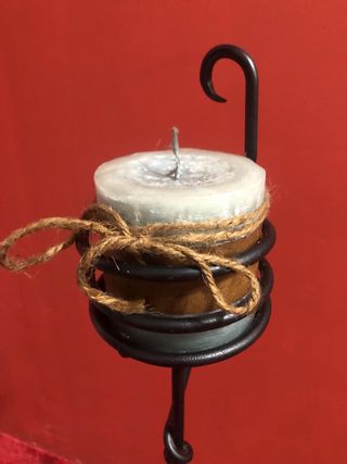 Portavelas decorativo de hierro forjado