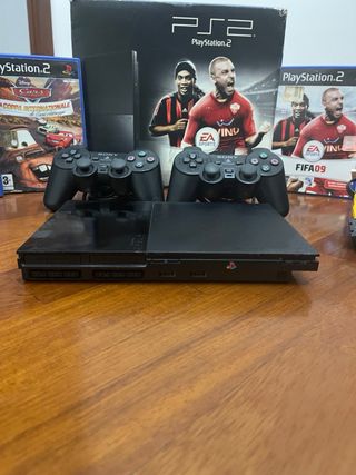 Playstation 2 slim +giochi +joypad +memory +cavi