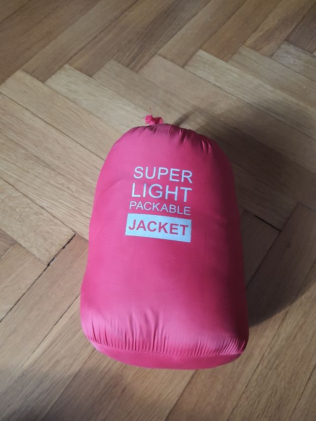 Primark piumino rosso con sacchettino