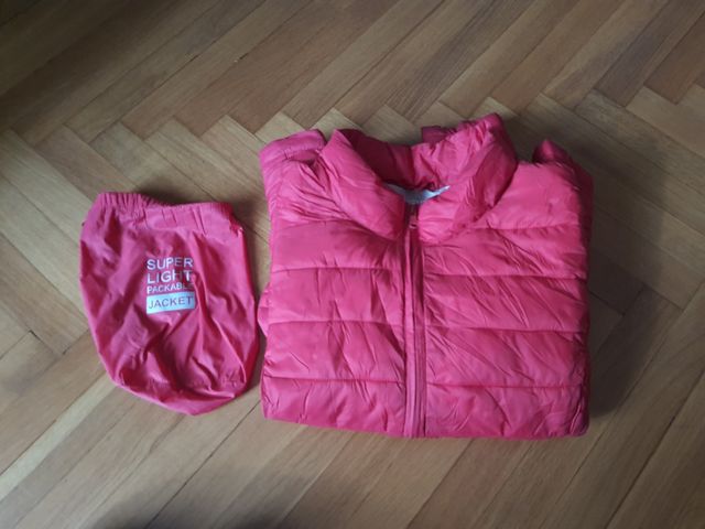 Primark piumino rosso con sacchettino