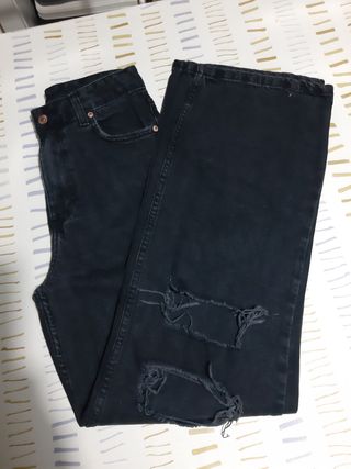 Jeans neri vita alta con strappi ginocch