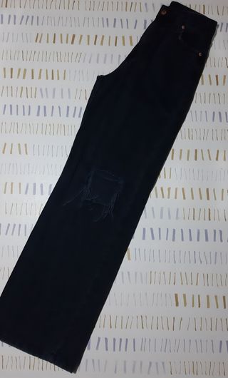 Jeans neri vita alta con strappi ginocch