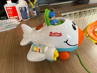 Juguete niño avion para arrastrar