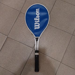 Raqueta kawasaki tenis tiro largo.