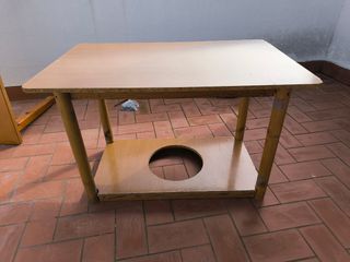 Mesa de camilla con ropa