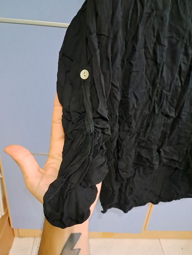 Blusa negra de Liberatta
