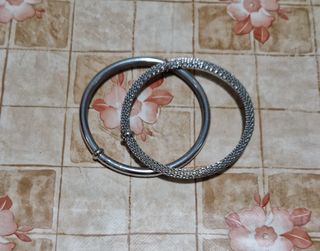 Bracciali rigidi in metallo